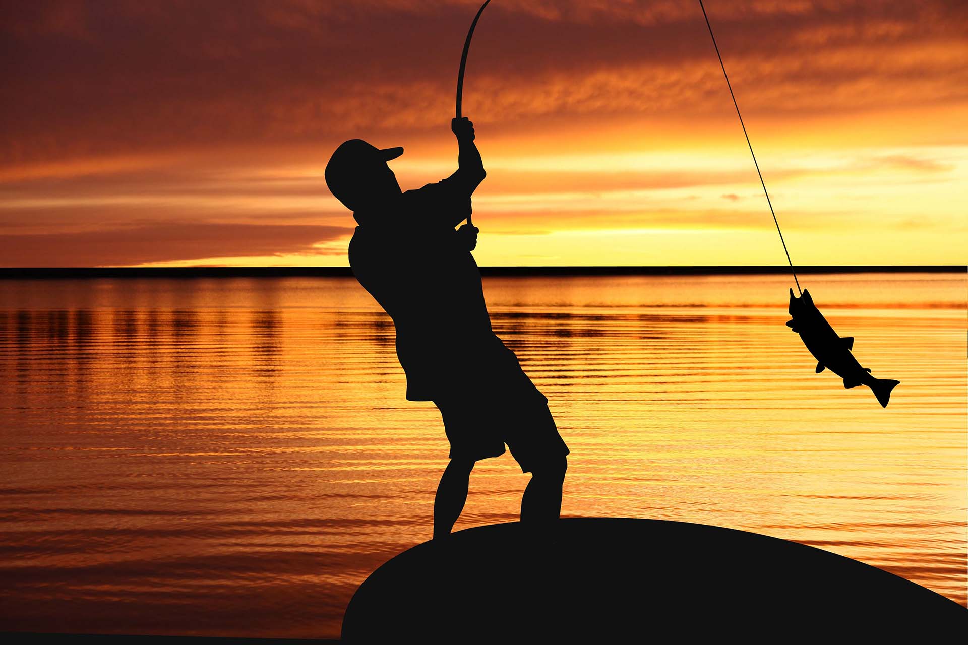fisherman catching fish during the sunrise