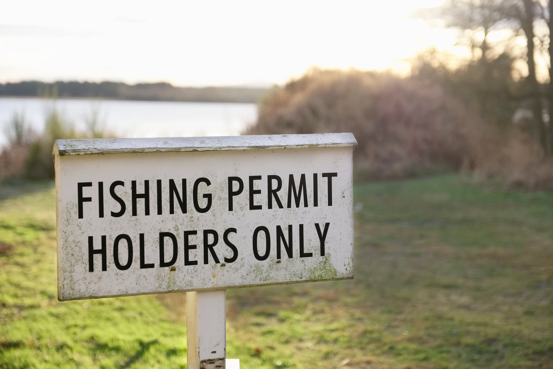 Fishing permit holders only sign