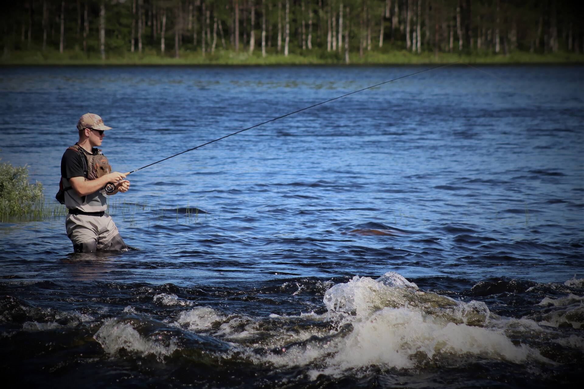 Man fishing in a river