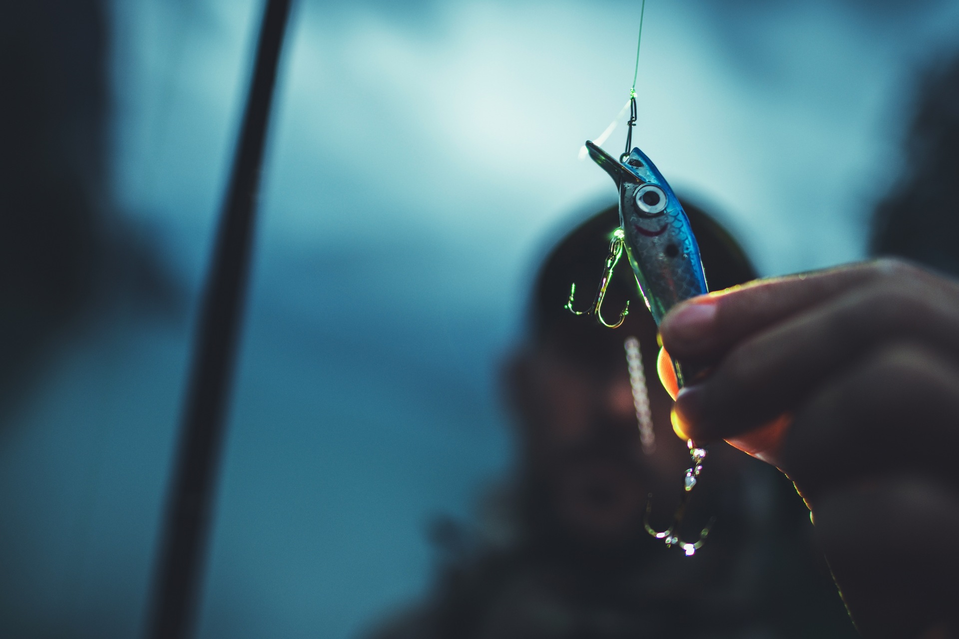 Man holding a fishing lure