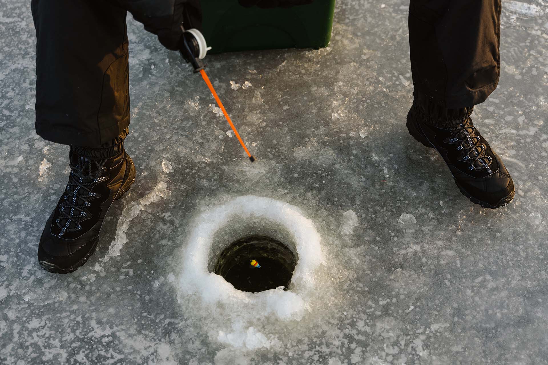a person ice fishing