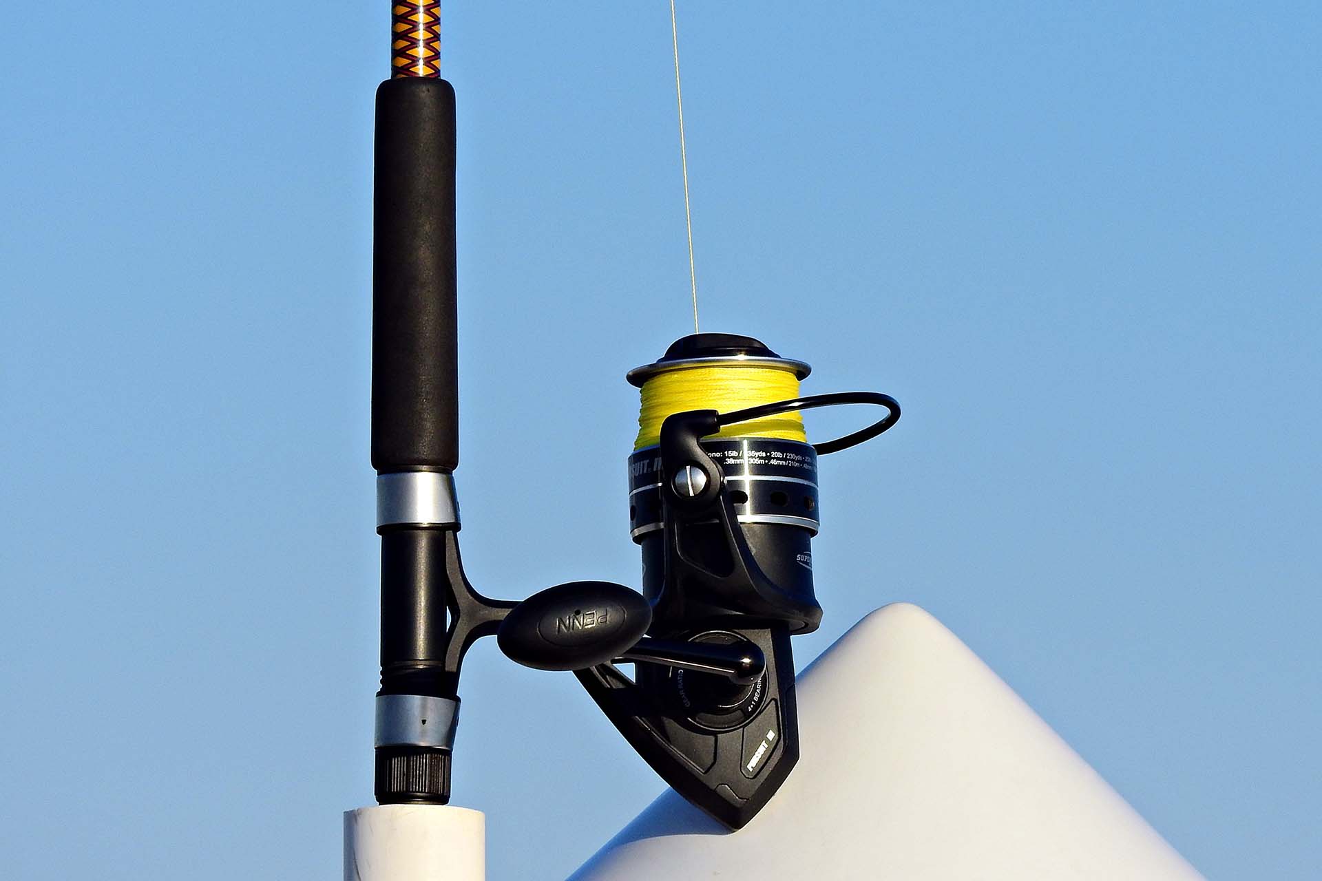 A fishing rod and reel on a boat