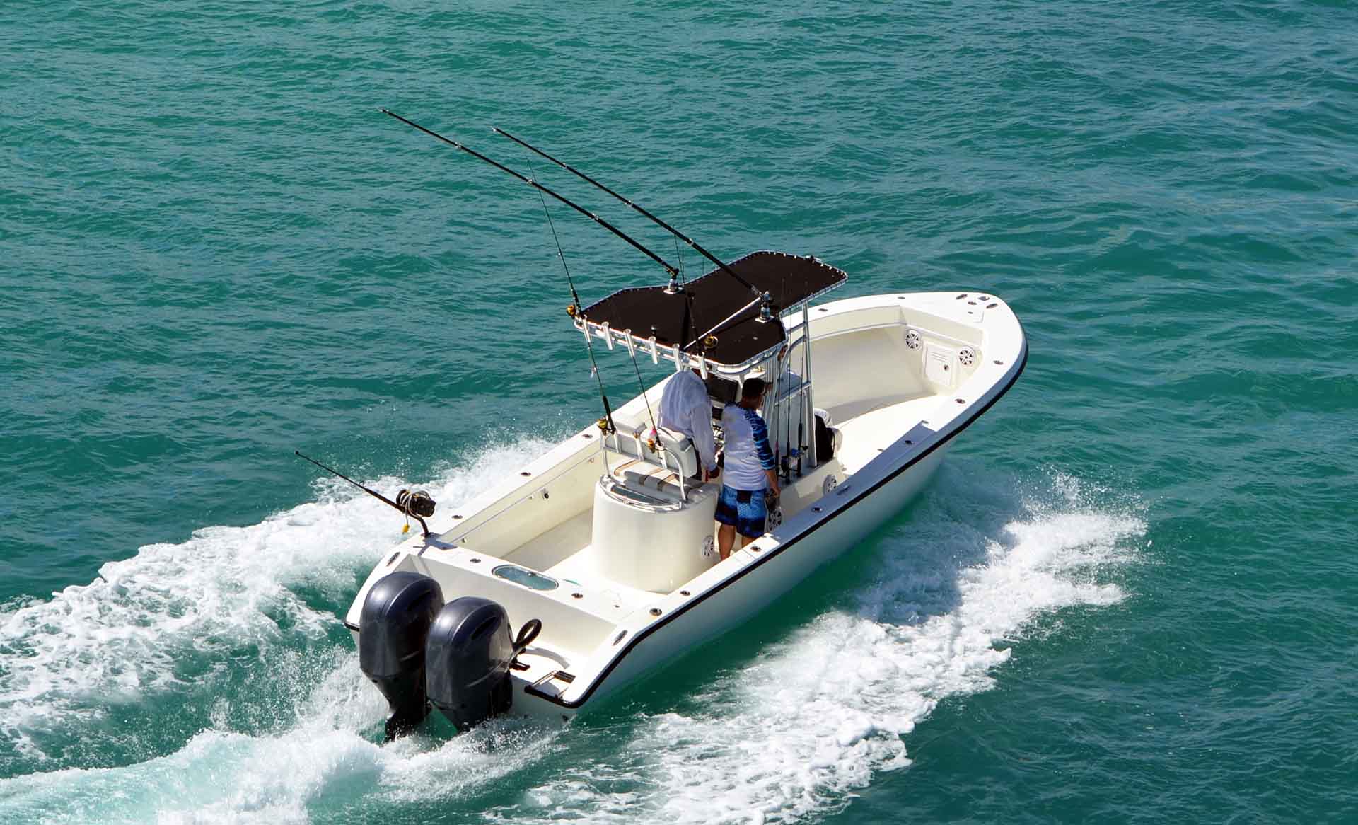 Angled overhead view of an open sport fishing boat