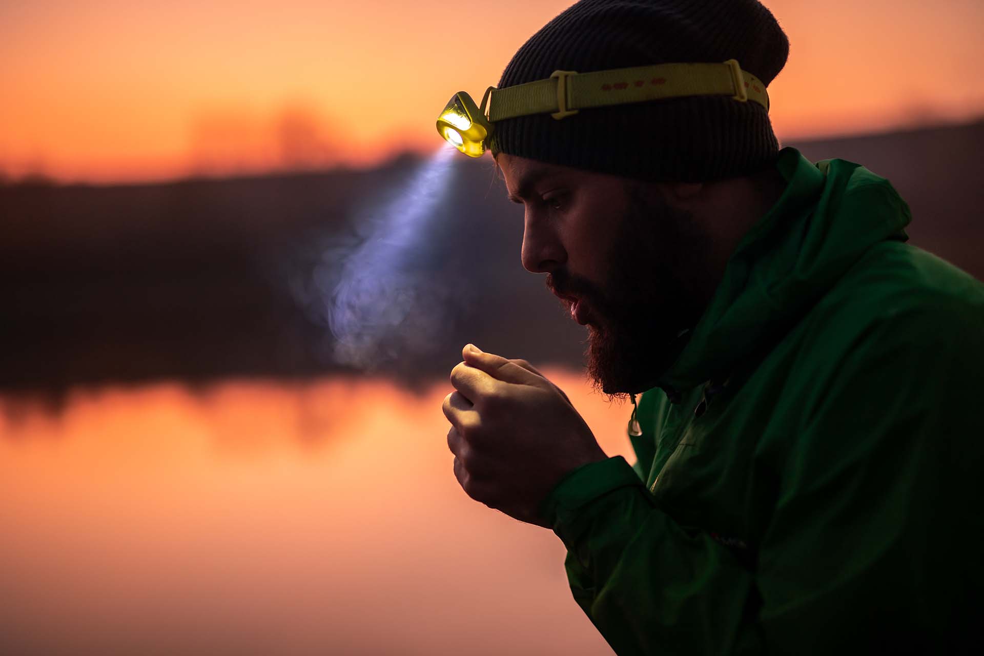 A man with a headlamp