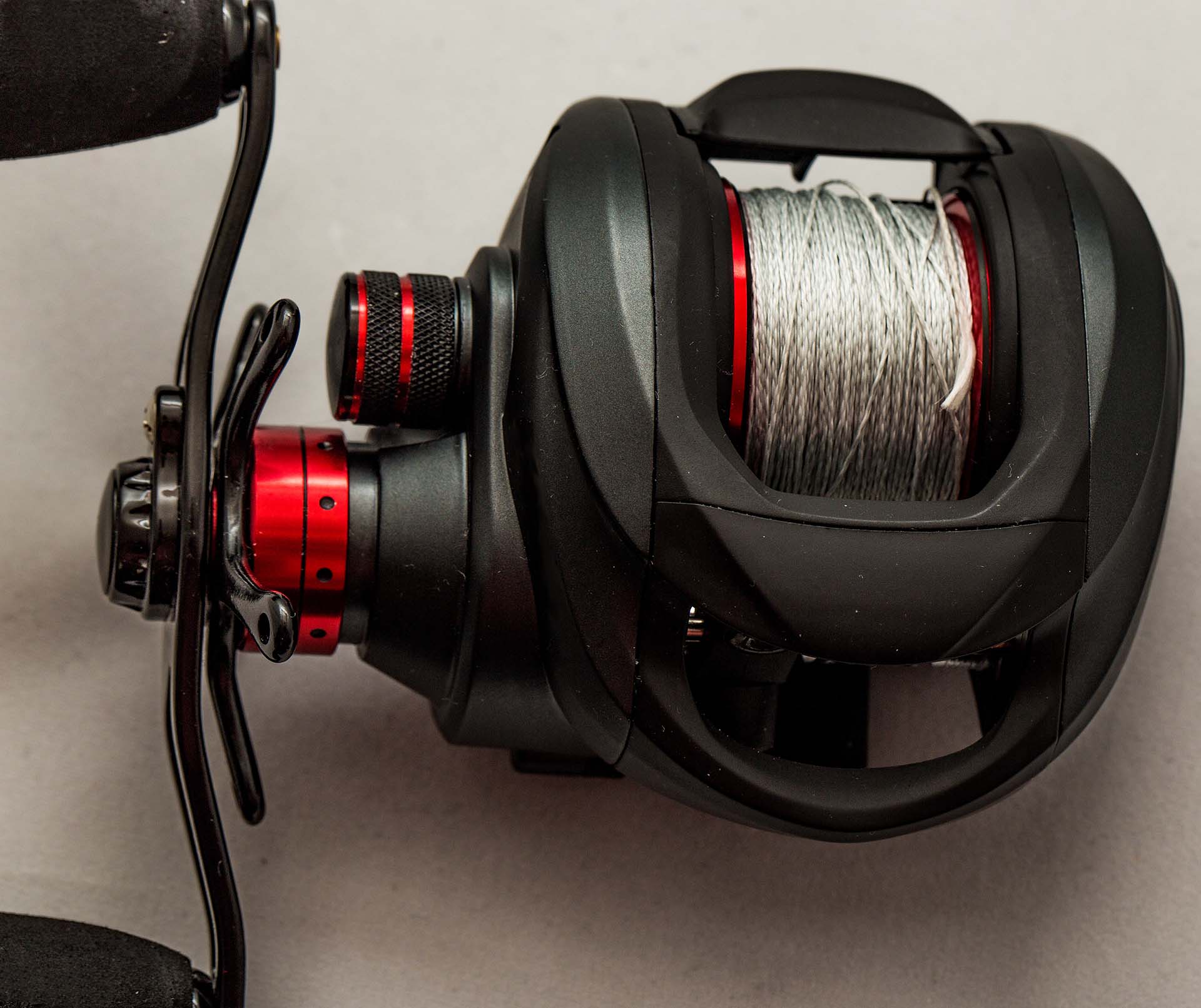 Close-up of baitcasting reel loaded with braided line