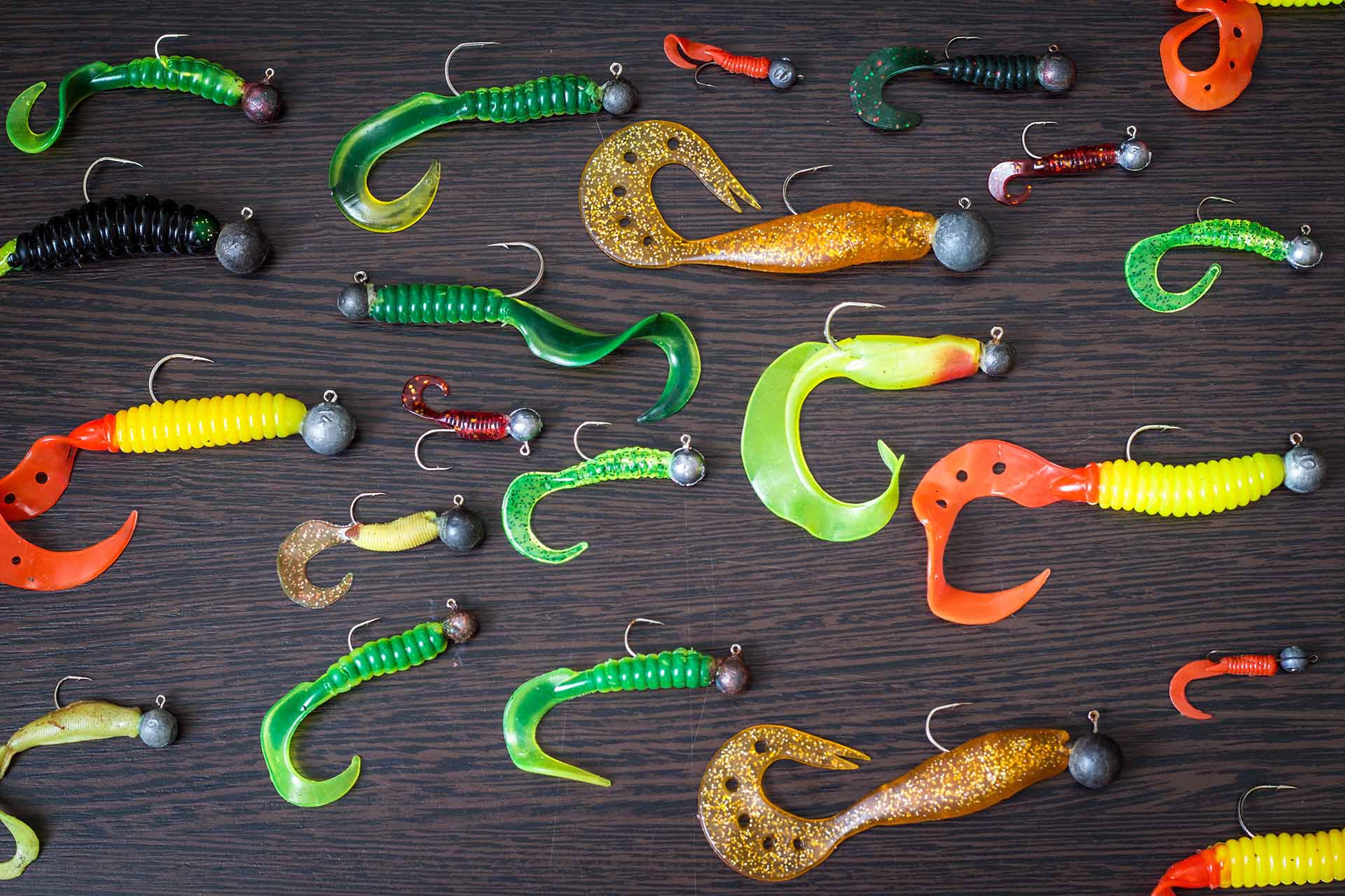 Silicone lures. Twisters on a black background