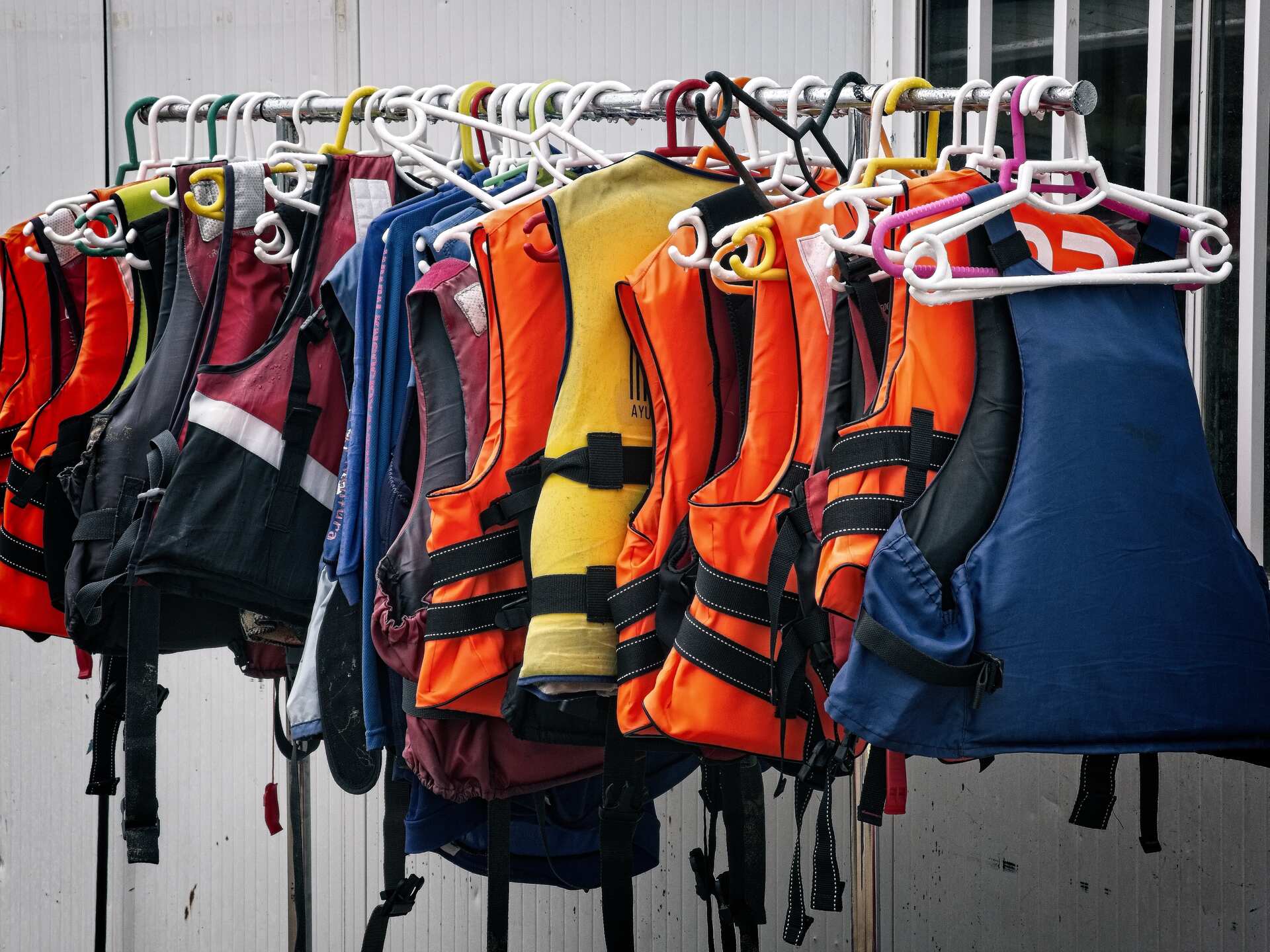 Rack with numerous life jackets