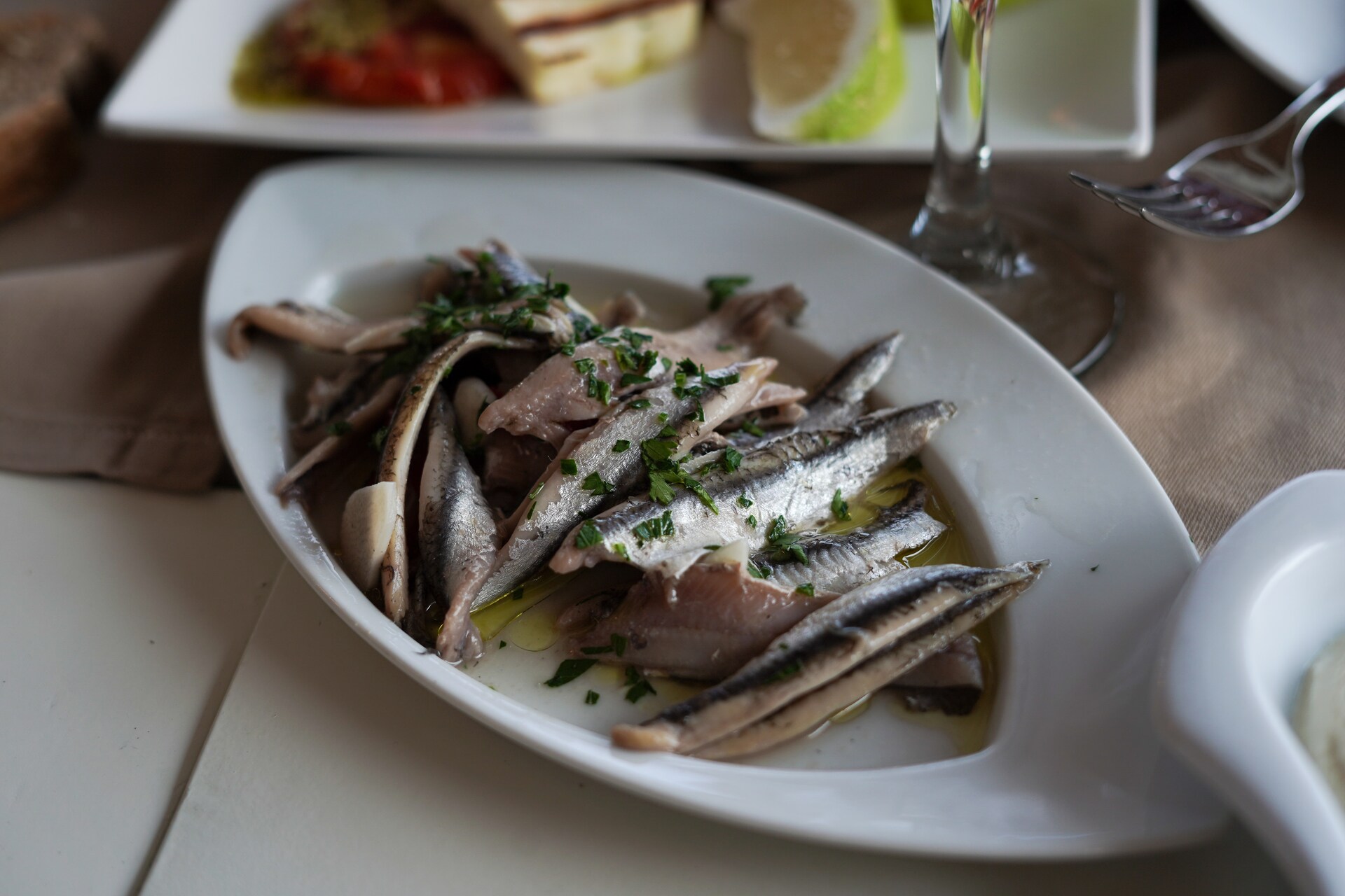 Canned sardines in a dish 