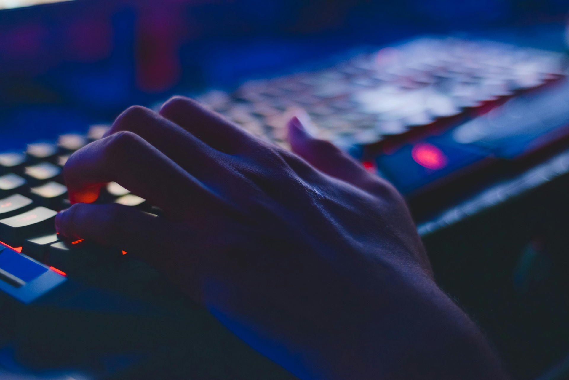  Person typing on a computer board 