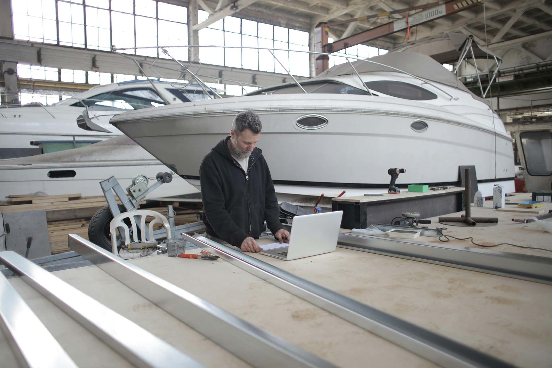 A man checking the boat's computer 