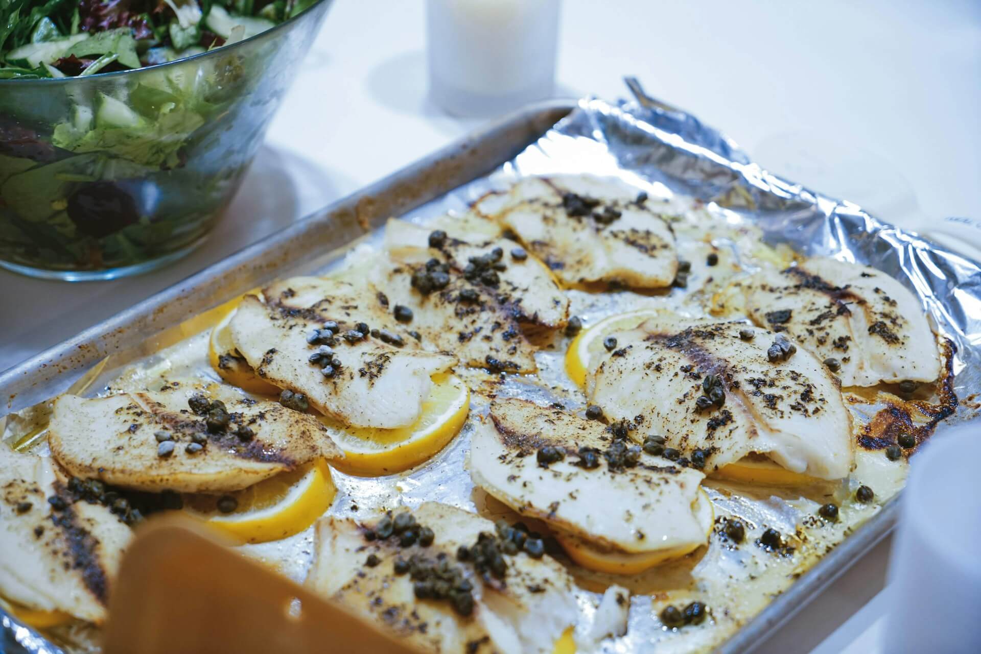 Baked fish with lemon