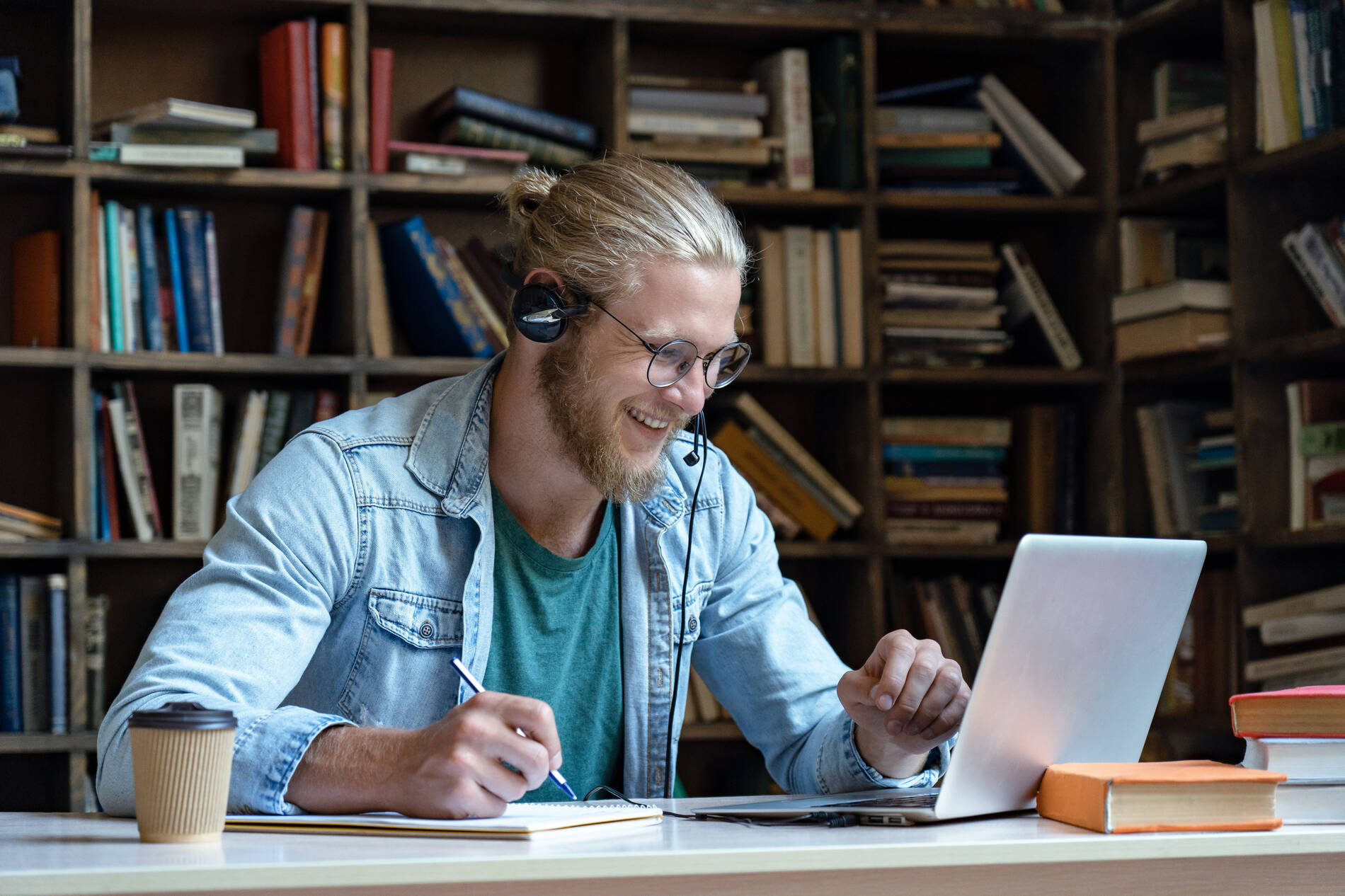 A man researching on a laptop